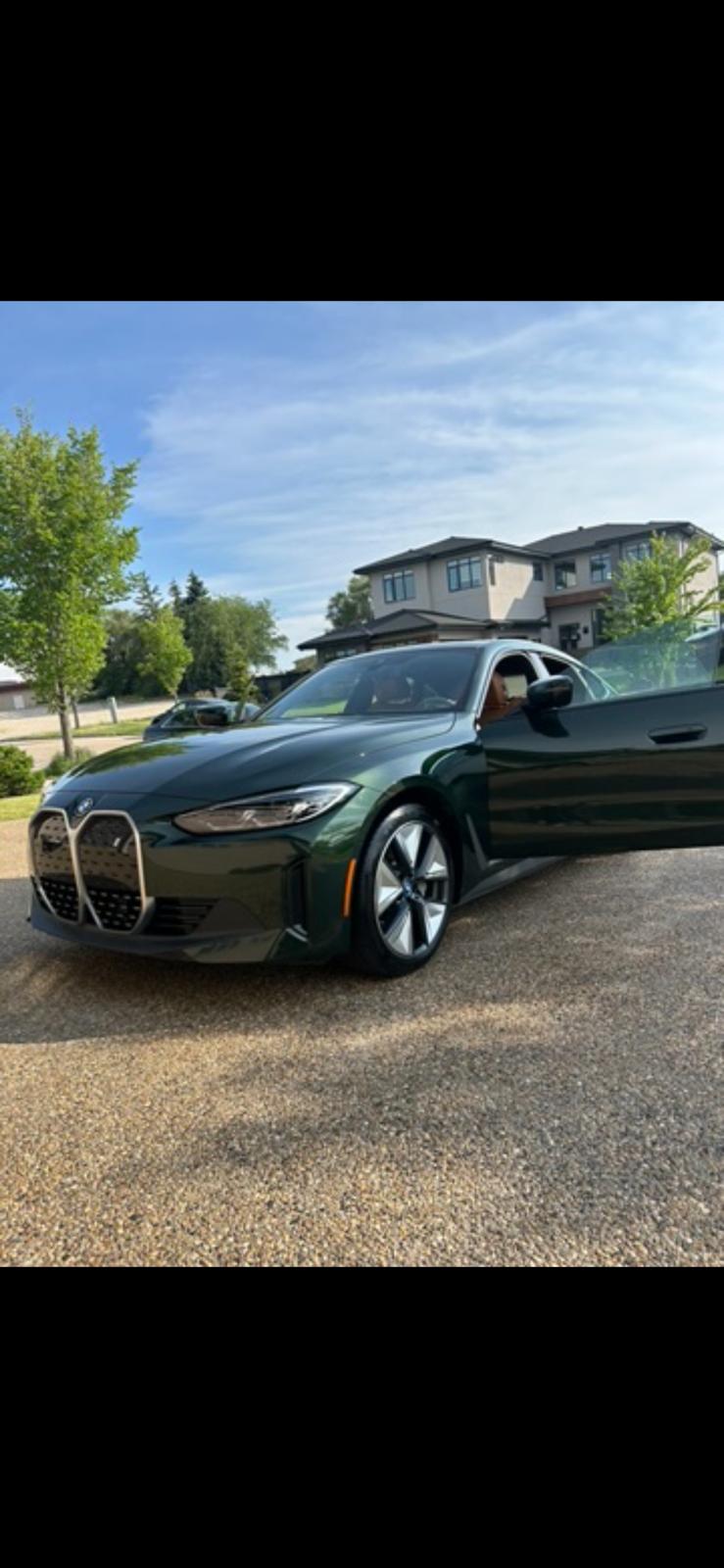 Green BMW i4 full exterior detail